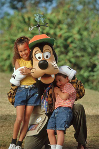 goofy with guests at disney's animal kingdom